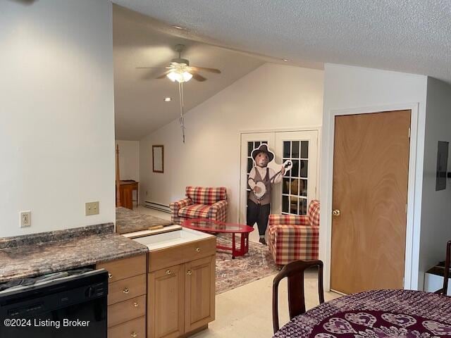 kitchen featuring ceiling fan, french doors, dishwasher, lofted ceiling, and light carpet