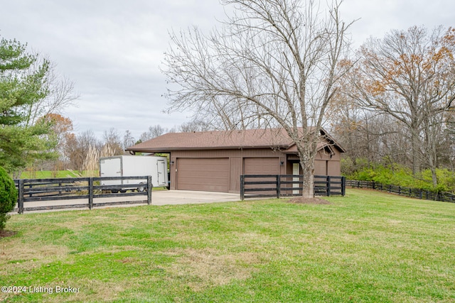 view of outdoor structure with a lawn