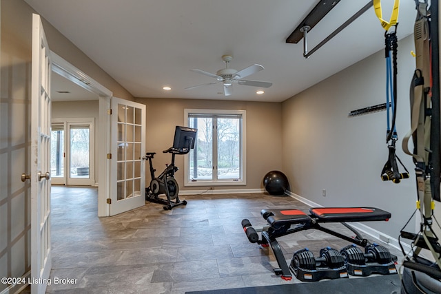 exercise area featuring ceiling fan, a wealth of natural light, and french doors