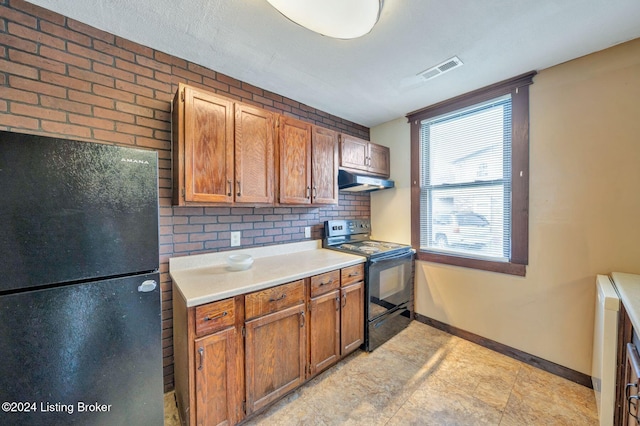 kitchen with decorative backsplash and black appliances