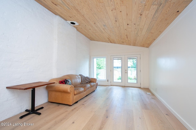 living area with wooden ceiling, lofted ceiling, light wood-type flooring, and french doors