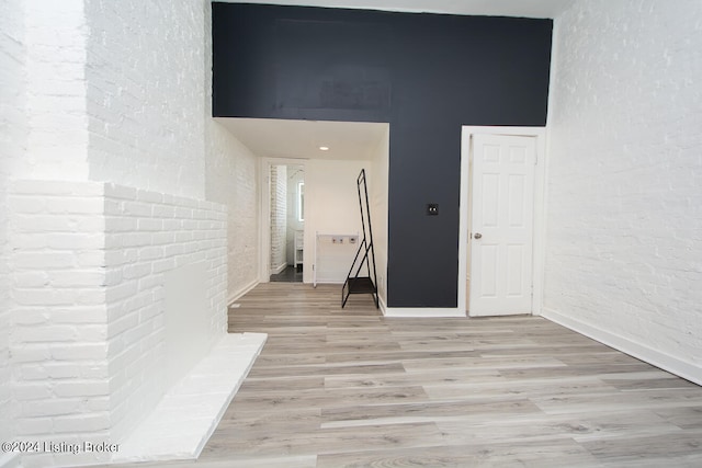 corridor featuring light wood-type flooring