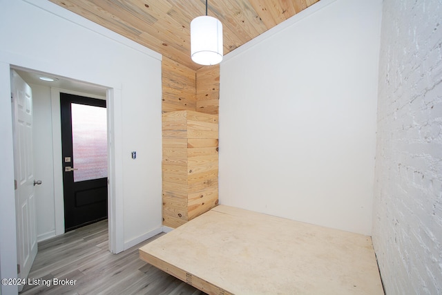 corridor with wood ceiling and wood-type flooring