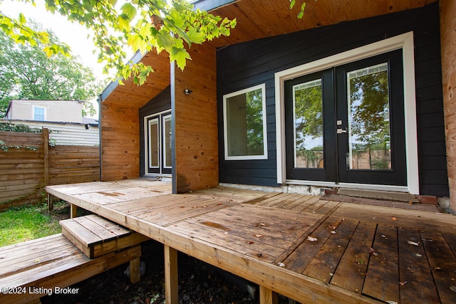 wooden deck featuring french doors