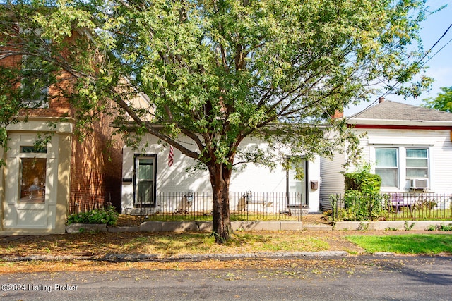 view of front of home with cooling unit