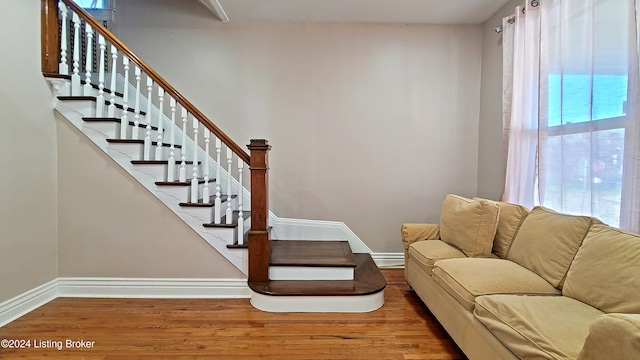 living room featuring hardwood / wood-style floors and a baseboard radiator