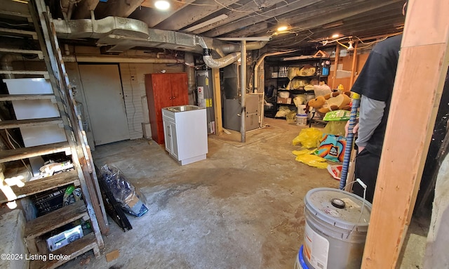 basement with heating unit and water heater