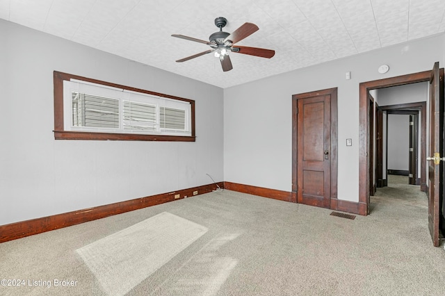 bedroom featuring ceiling fan and carpet floors