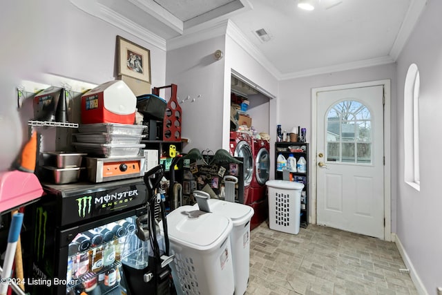 entrance foyer featuring ornamental molding