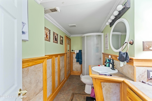 bathroom featuring vanity, toilet, walk in shower, and ornamental molding