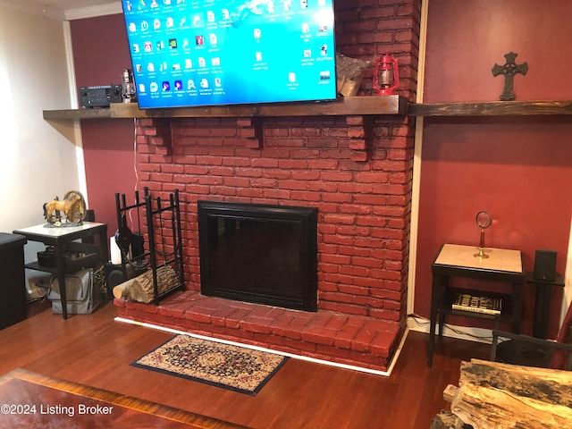 room details featuring hardwood / wood-style floors and a fireplace