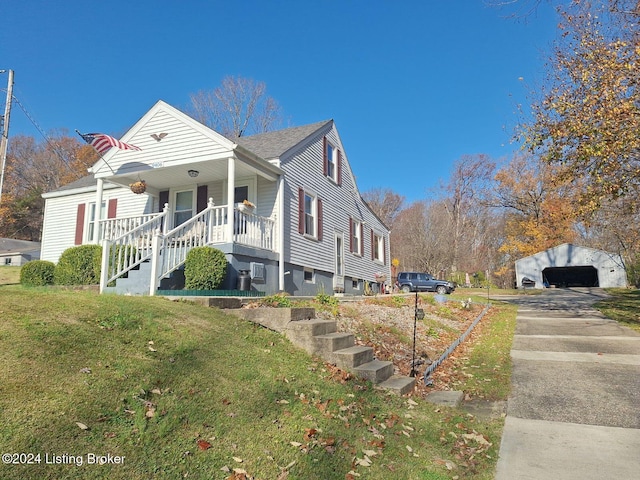 view of side of property featuring a yard and covered porch