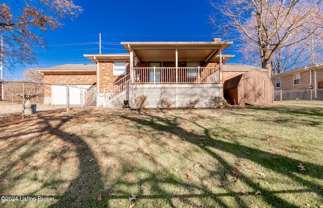 view of front of property featuring a front lawn and a storage shed