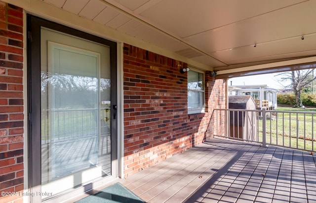 wooden terrace with a porch