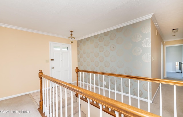 hall featuring light colored carpet and crown molding