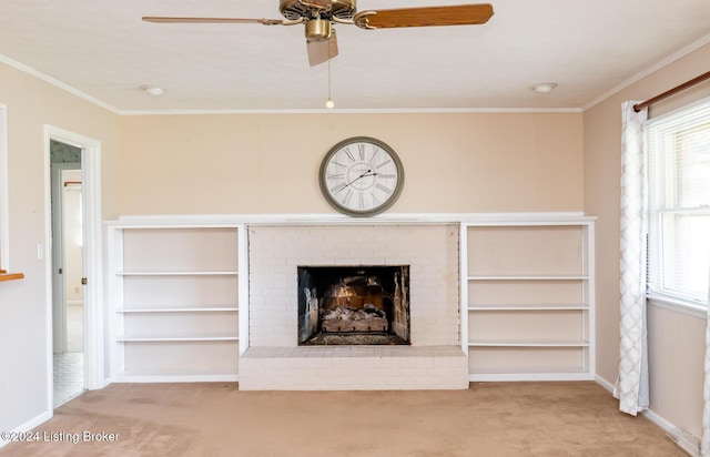 unfurnished living room with ceiling fan, a fireplace, crown molding, and light carpet