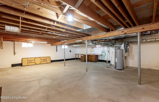 basement featuring gas water heater