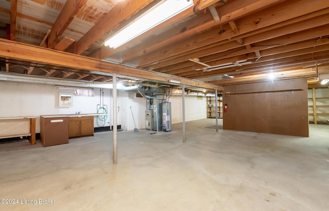 basement featuring water heater