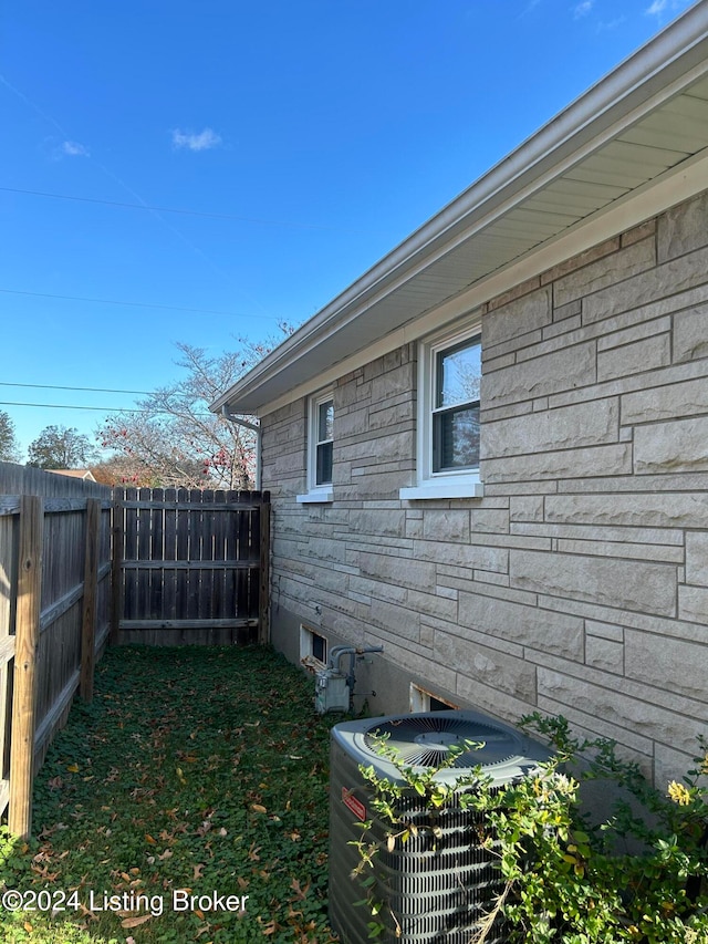 view of home's exterior featuring central AC unit