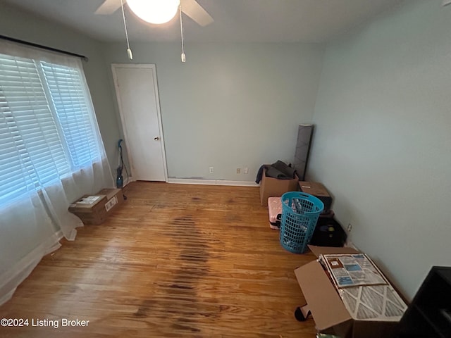 interior space featuring ceiling fan and hardwood / wood-style flooring