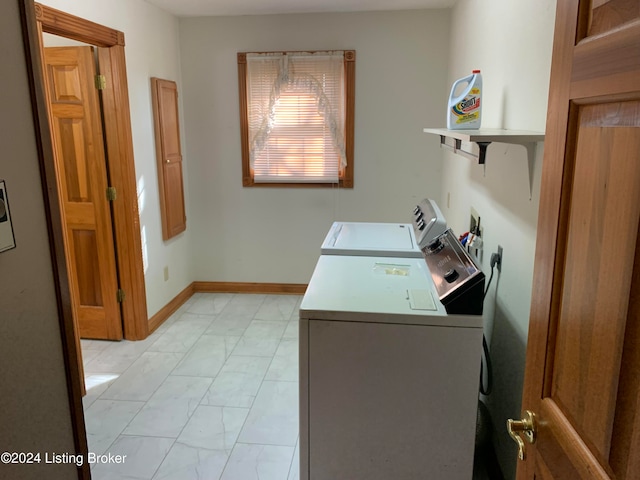 laundry area with separate washer and dryer