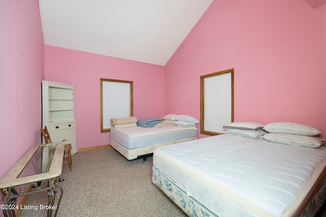 bedroom featuring light carpet and high vaulted ceiling