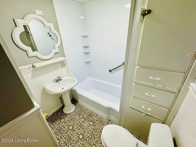 full bathroom featuring shower / bathing tub combination, toilet, and sink