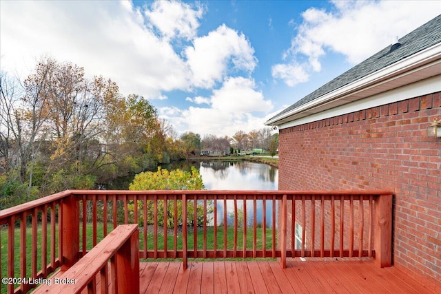 wooden terrace with a water view