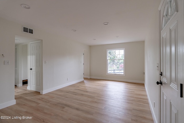 unfurnished room featuring light hardwood / wood-style flooring