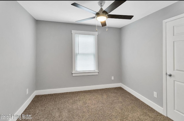 unfurnished room featuring ceiling fan and carpet