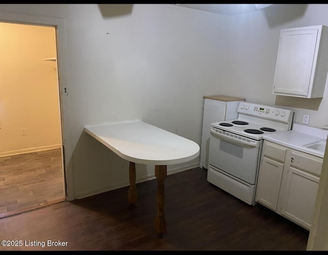 kitchen with dark hardwood / wood-style flooring, sink, white cabinets, and white electric range oven