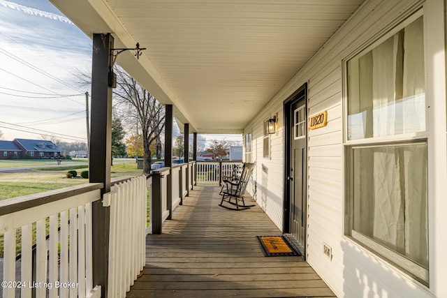 deck with covered porch