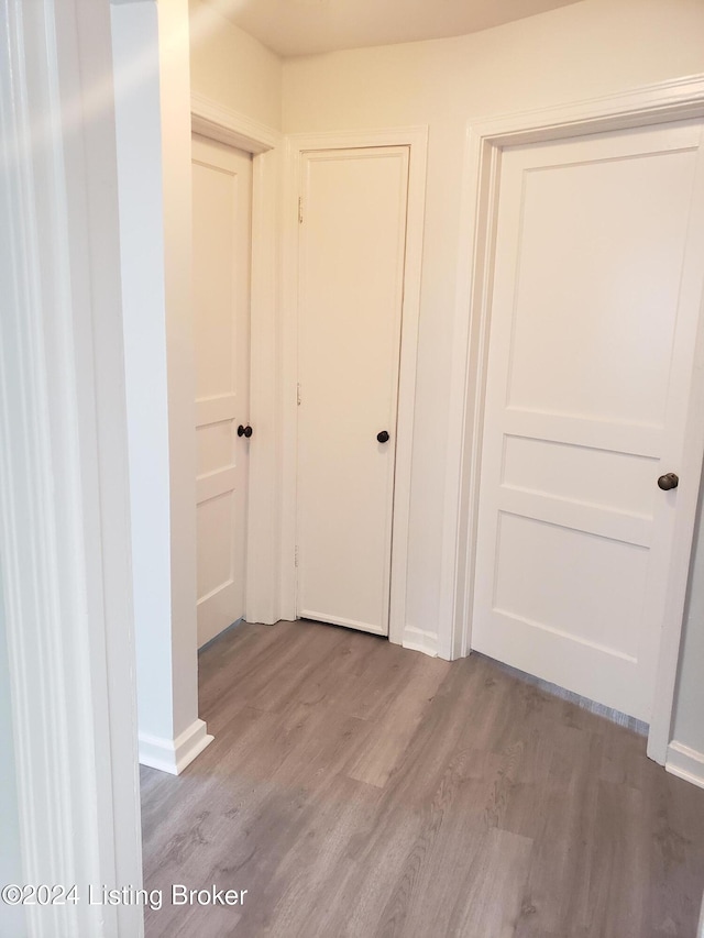 hallway featuring light wood-type flooring