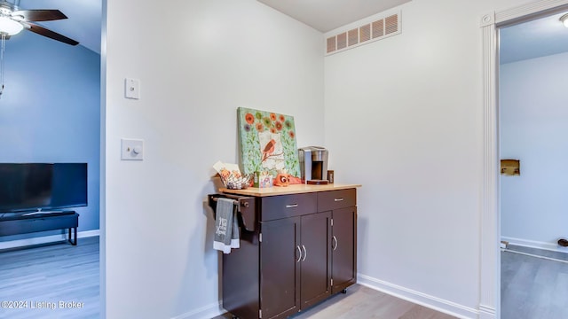 interior space featuring hardwood / wood-style floors and ceiling fan