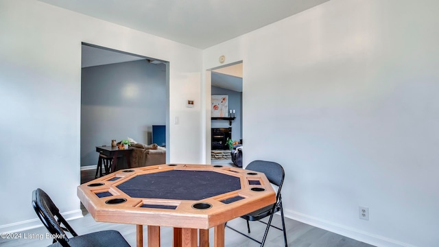 dining area with wood-type flooring