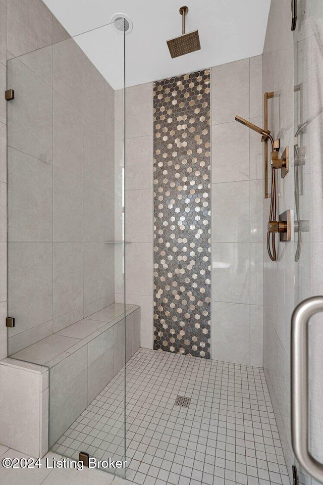 bathroom with an enclosed shower