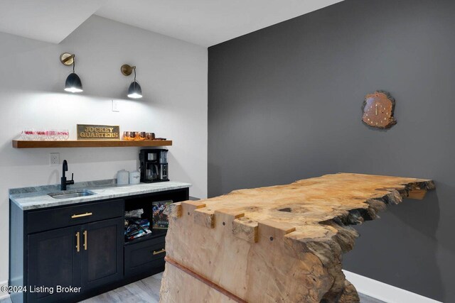 interior space with sink and light hardwood / wood-style floors