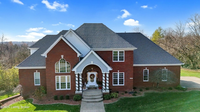 front of property featuring a front lawn