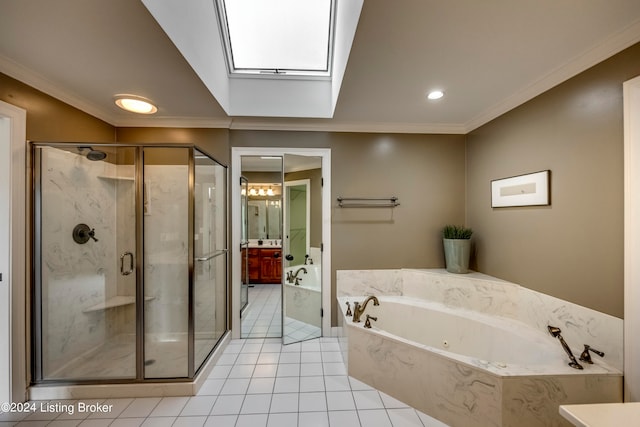 bathroom with a skylight, tile patterned flooring, crown molding, shower with separate bathtub, and vanity