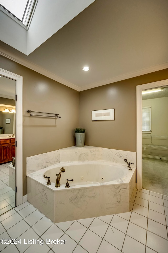 bathroom featuring tile patterned floors, crown molding, tiled tub, and a skylight