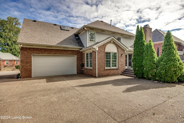 view of property featuring a garage