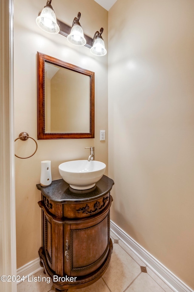 bathroom featuring tile patterned floors and vanity