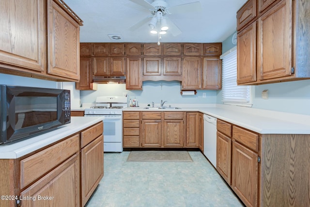 kitchen with ceiling fan, white appliances, and sink