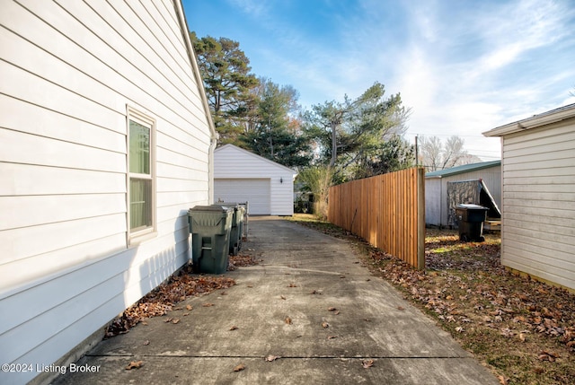 view of side of property with an outdoor structure