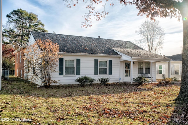 ranch-style house with a front yard