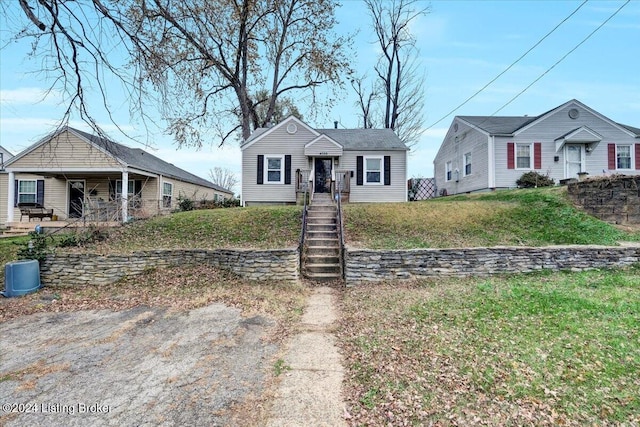 view of front of property with a front lawn