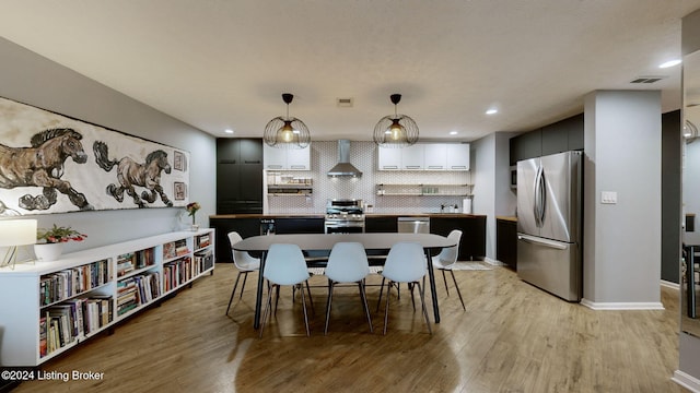 dining room featuring light hardwood / wood-style floors