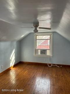 additional living space featuring ceiling fan, wood-type flooring, and lofted ceiling