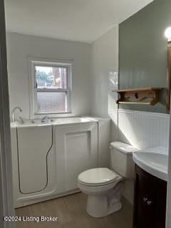 bathroom with vanity and toilet