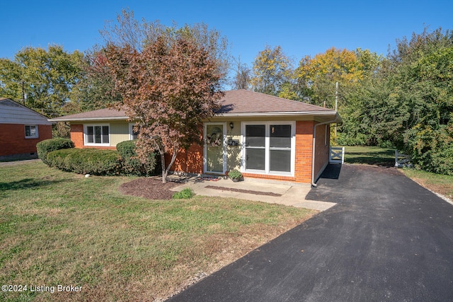 view of front of home with a front yard